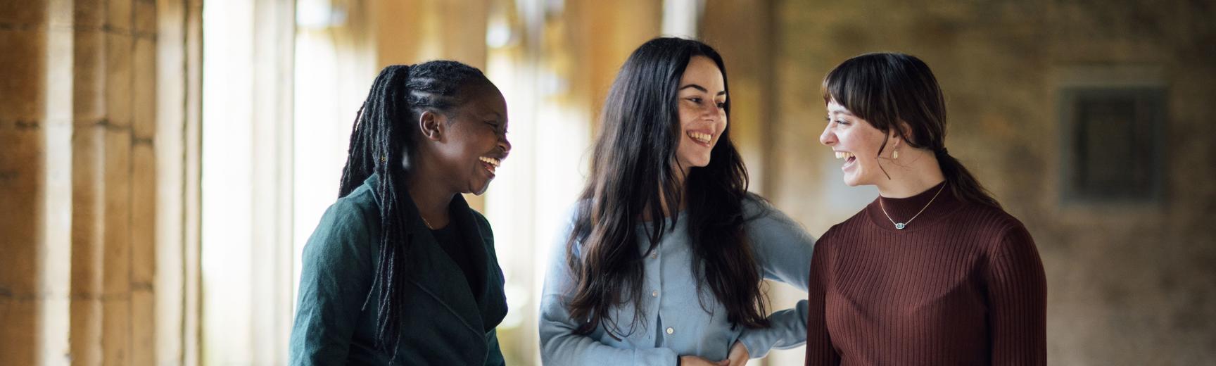 Three students talking